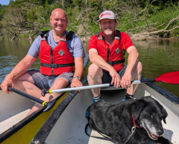 2 guys and a dog in a canoe on the River Severn - Hire A Canoe